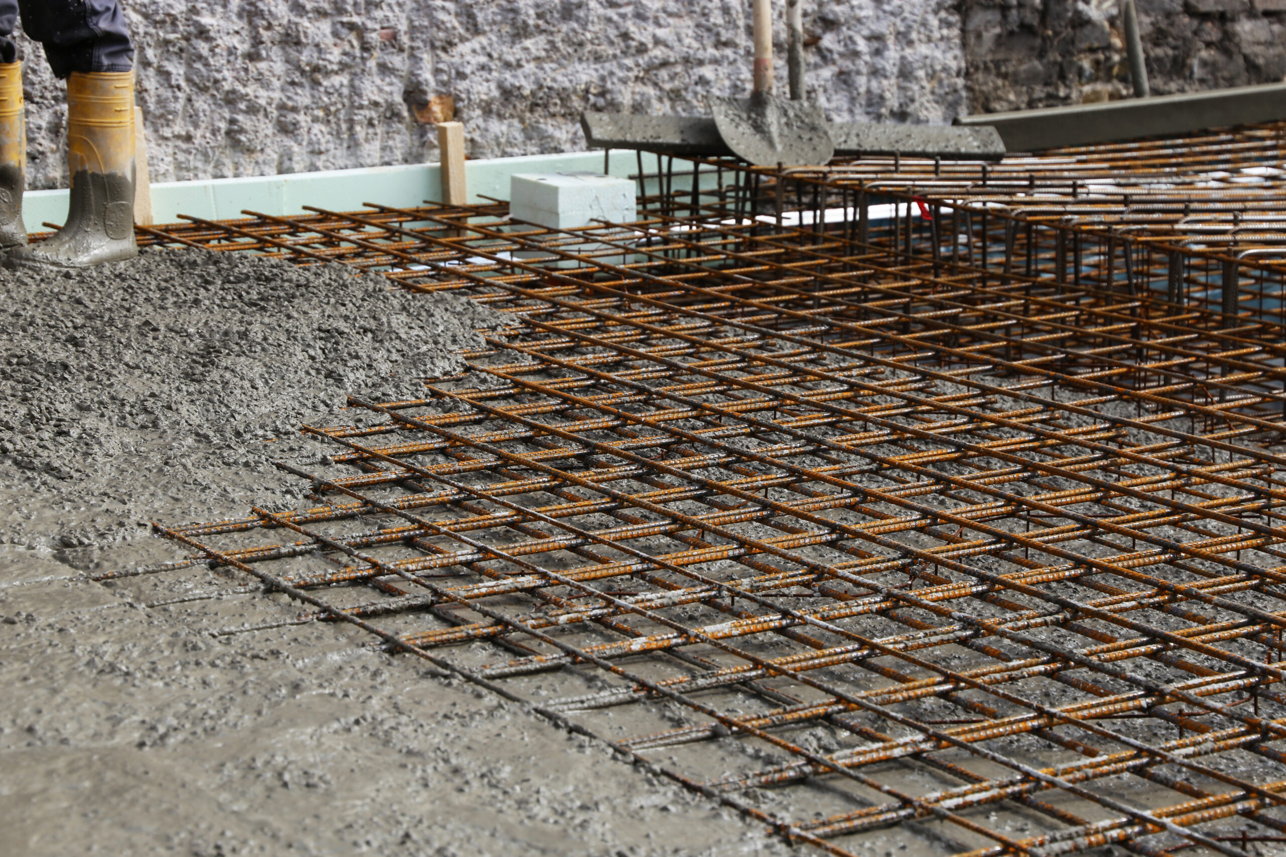 Concrete slab foundation being poured